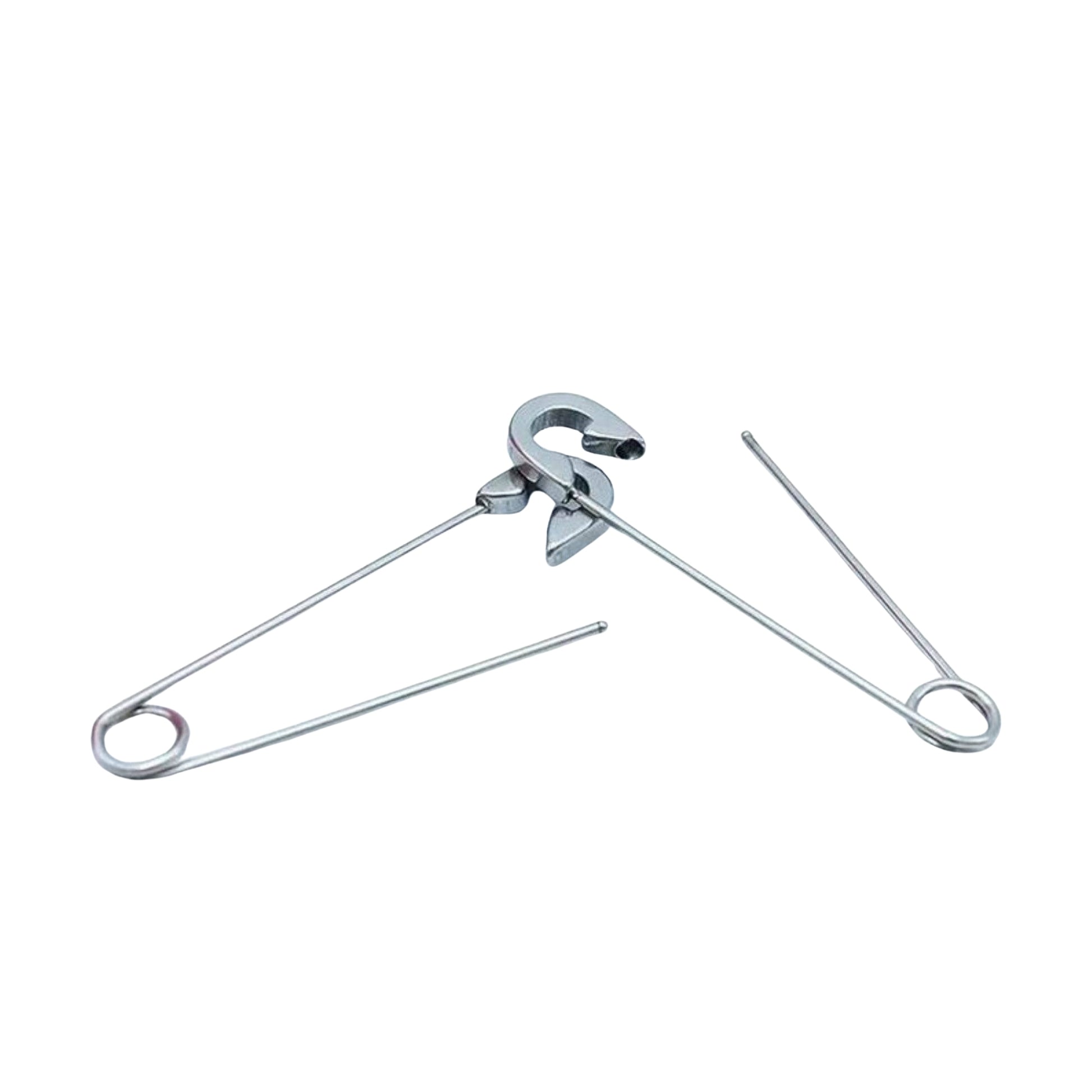 Metal safety pin earrings on a white background